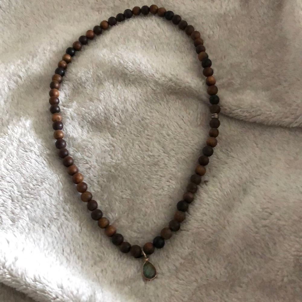 Necklace or bracelet if wrapped twice around arm